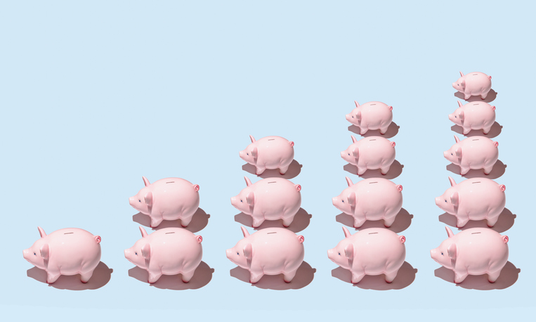 Multiple piggy banks align to form chart