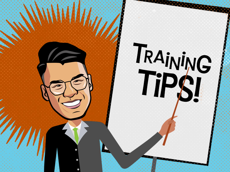 Martín holding a pointer at a posterboard with the words 'training tips'