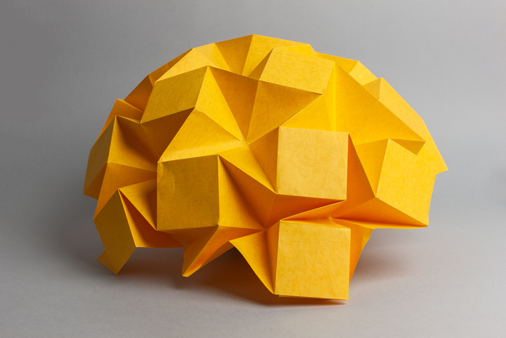 Brain made out of yellow paper